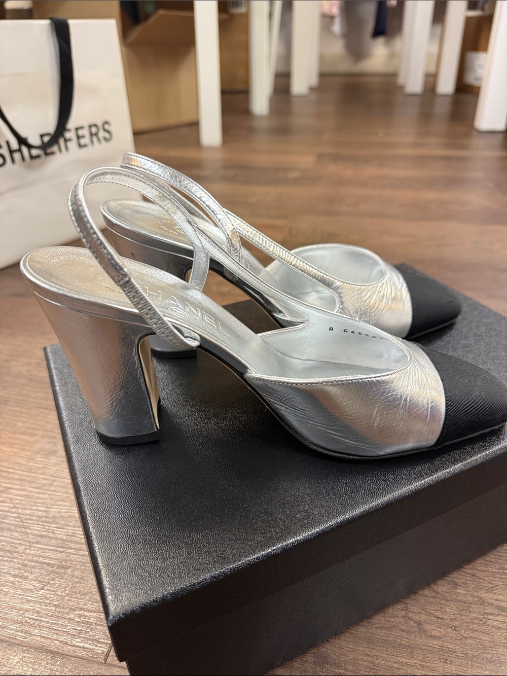 CHANEL Silver Leather Slingback Heels with Black Cap Toe